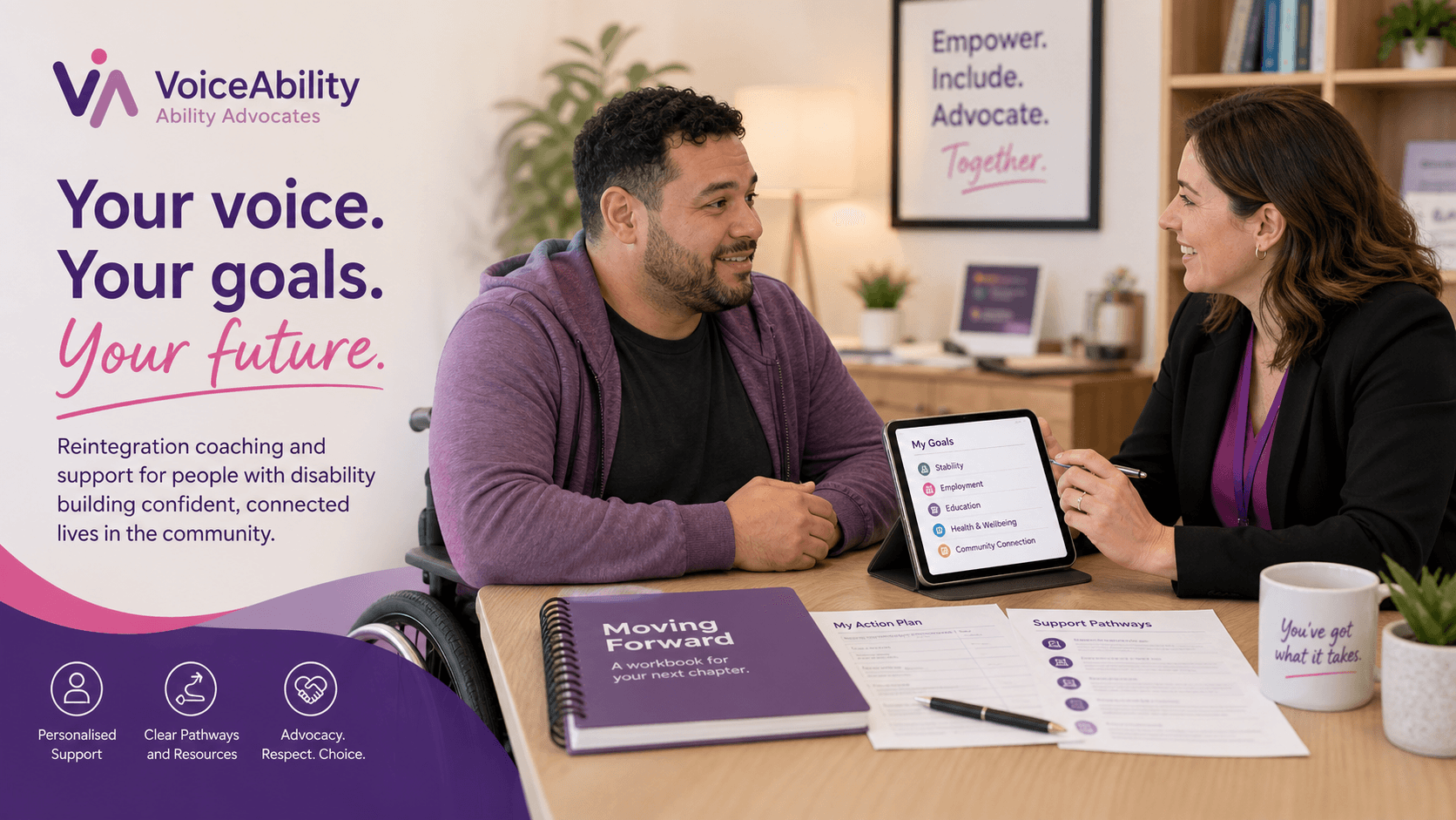 A woman and a man in a wheelchair discuss personal goals using a tablet.